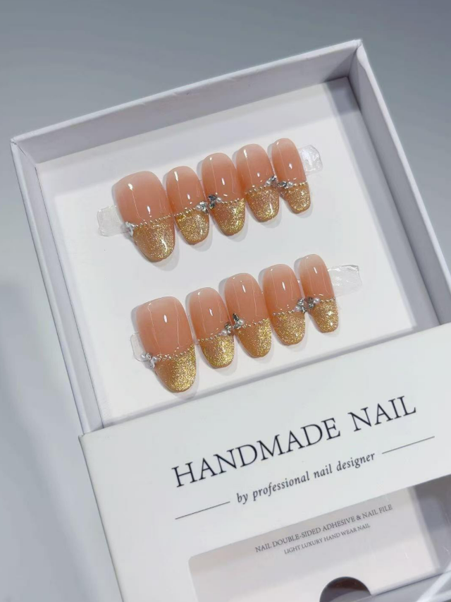 Medium Oval Nude & Shimmering Gold French Tip With Crystals