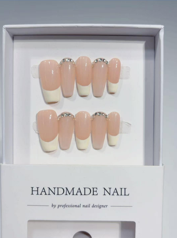 Elegant Nude French Tip & Crystal Accents Medium Coffin